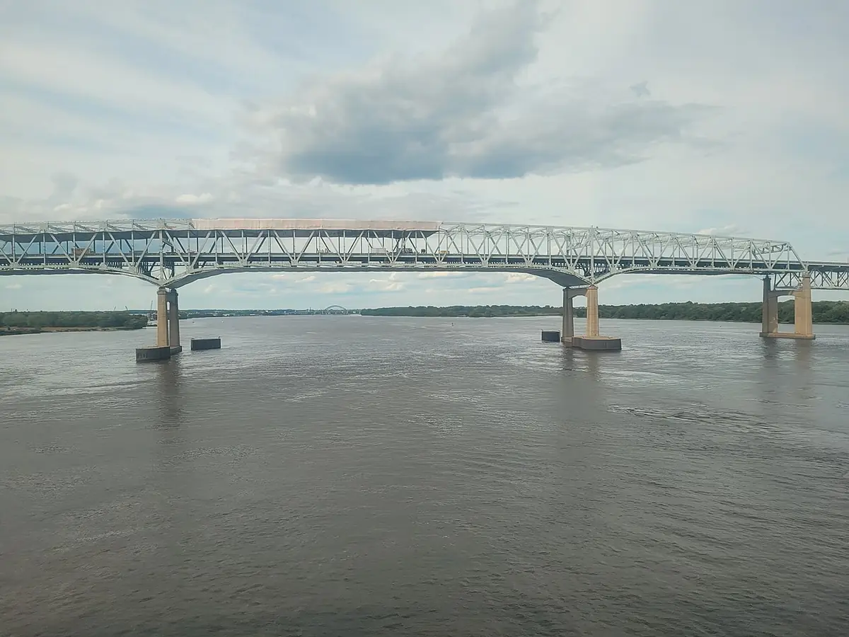 The Betsy Ross Bridge spanning the Delaware River under an overcast sky
