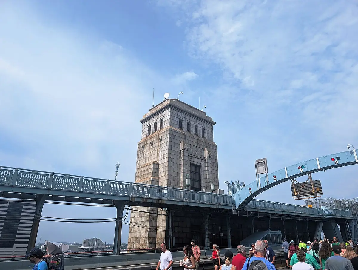 The Benjamin Franklin Bridge, with pedestrians walking its main span during an anniversary celebration